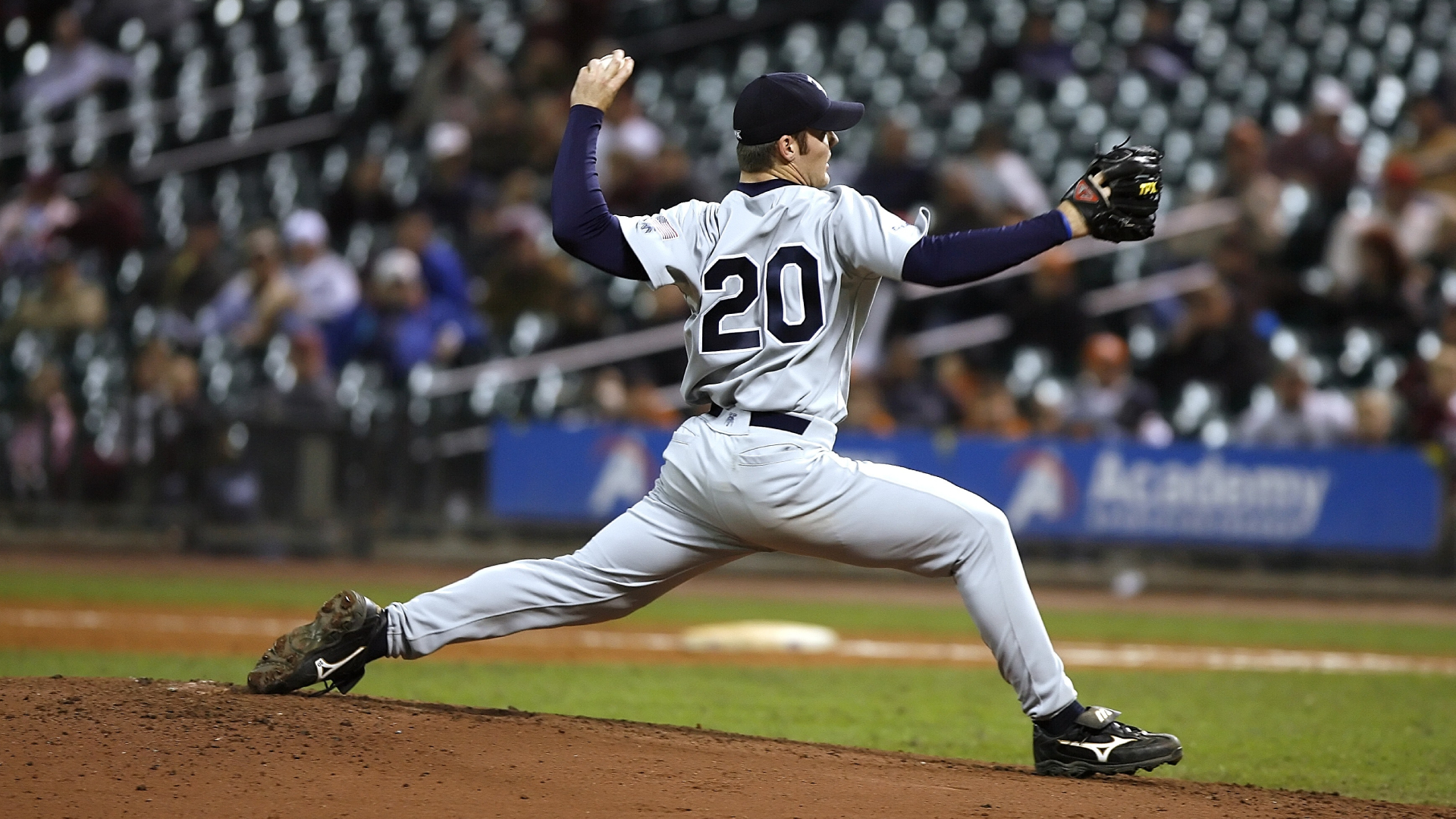 Baseball pitcher in 20 jersey about to pitch