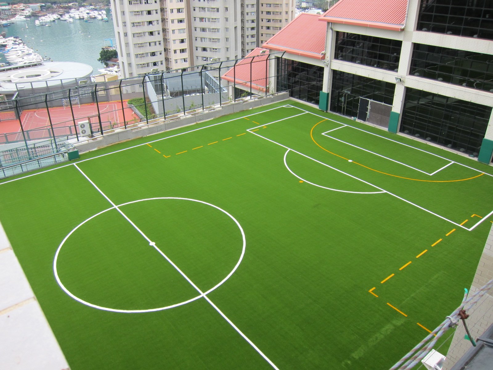 multi purpose artificial turf field on a roof top